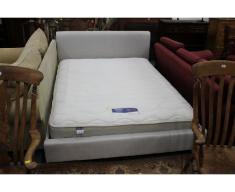A light grey fabric king size bed with silent night mattress 