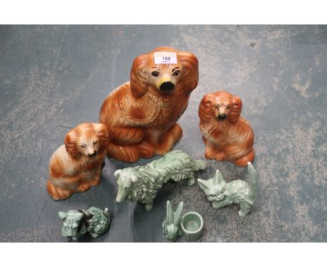 Three Staffordshire dogs and four Sylvac animals