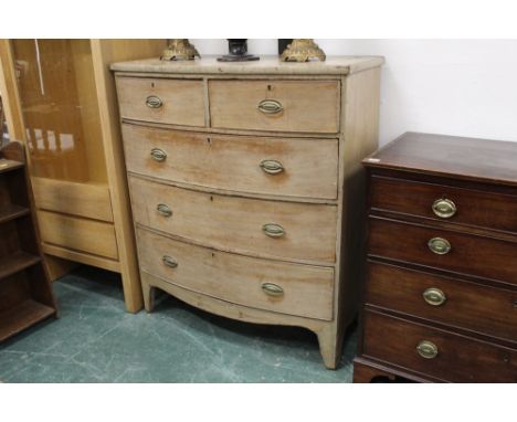 A 19th century 2/3 bow fronted chest of drawers with bleached appearance, measuring 120 cm high x 104 cm wide  