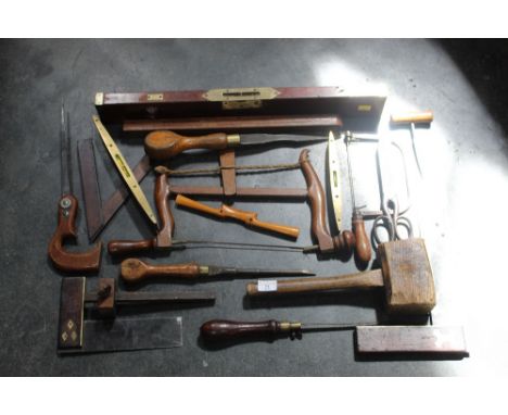 Box of vintage tools, a Mathieson brass mounted spirit level, two brass mounted T squares, pad saw, chisel etc 