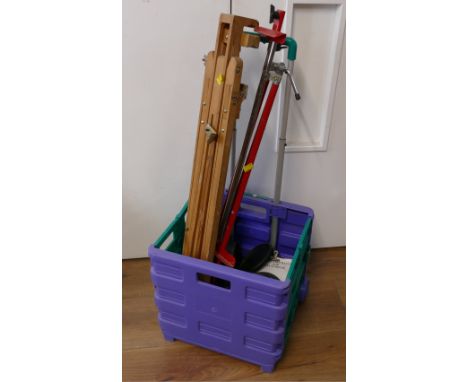 Wheeled storage crate, two easels and tumbler machine