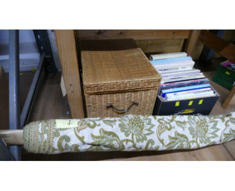 Wicker hamper, quantity of cookbooks and 6 yard roll of tapestry fabric