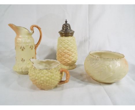 Royal Worcester - an early 20th century four piece, blush ivory tea set comprising sugar sifter, cream jug, milk jug and suga