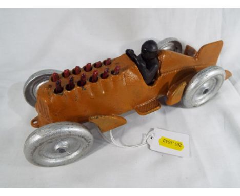 A cast iron model depicting a Hubley racing car with moveable pistons and driver, 27 cm (length) - Est £20 - £30