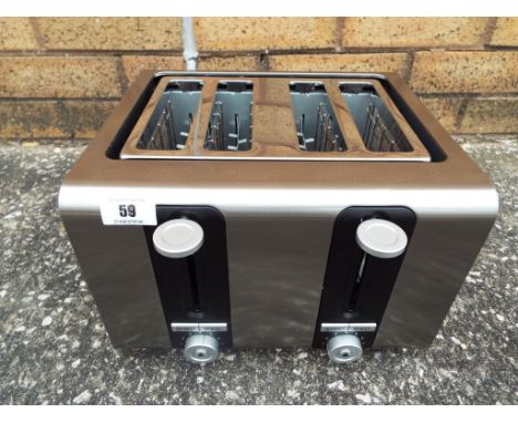 A good quality 4 slice toaster with re-heat button and defrost setting. Estimate £10 - £20