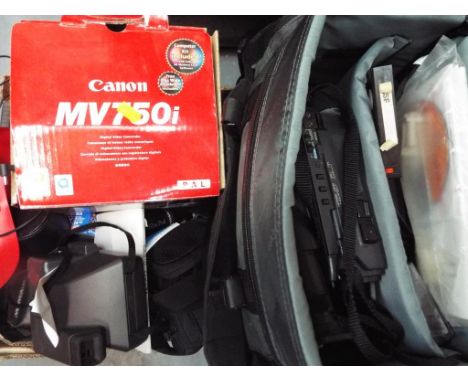 Photographic equipment - a mixed lot of photographic equipment to include a Canon MV750i,  Polaroid, a digital Casio recorder