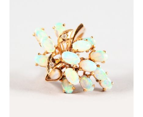 A 14CT YELLOW GOLD OPAL SET RING.