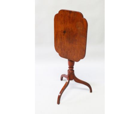 A 19th CENTURY MAHOGANY TILT TOP TRIPOD TABLE with shaped top, turned centre support ending in tripod curving legs. 2ft 5ins 