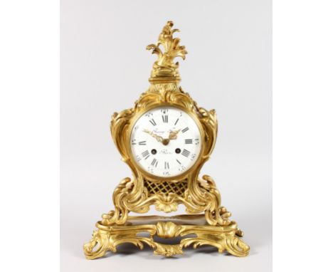 A GOOD LOUIS XVI ORMOLU CLOCK by RAINGO FRES A. PARIS, with white enamel dial, black Roman numerals and eight-day movement, t