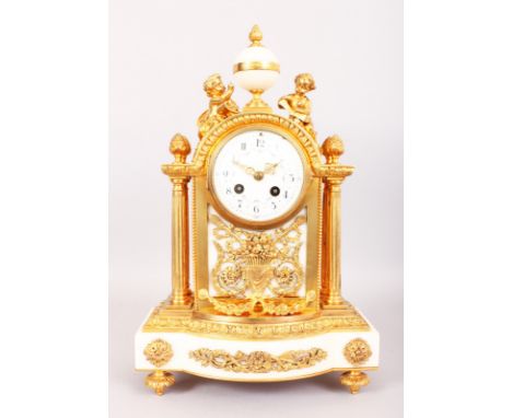 A GOOD LOUIS XVI ORMOLU AND WHITE MARBLE CLOCK, with eight-day movement, striking on a single bell, No. 1979, the case with c