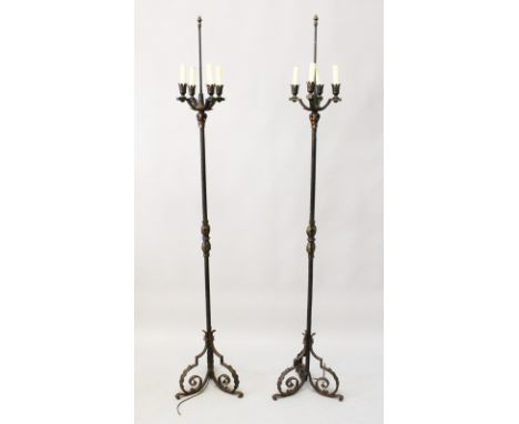 A GOOD PAIR OF WROUGHT IRON FOUR BRANCH STANDARD LAMP.