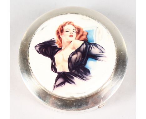 A SILVER ART DECO CIRCULAR COMPACT, Birmingham 1924, the lid with a semi nude.