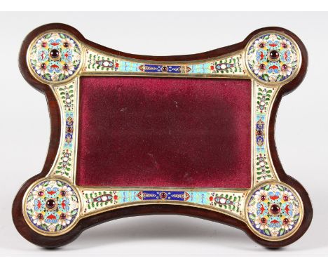 A RUSSIAN SILVER AND ENAMEL FABERGE DESIGN PHOTOGRAPH FRAME, the corners with four large roundels.  9.5ins x 7ins.