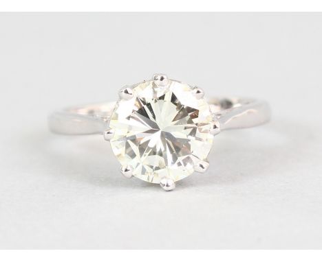 A GOOD 18CT WHITE GOLD BRILLIANT CUT SINGLE STONE DIAMOND RING, 2.25CTS, VS1 colour, K/L size.