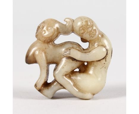 A GOOD CHINESE JADE EROTIC ROUNDEL.