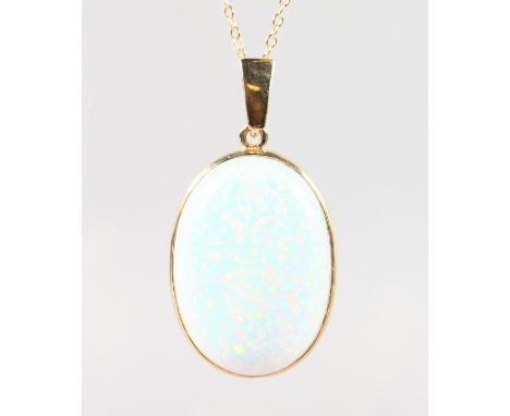 A 9CT GOLD OVAL OPAL PENDANT AND CHAIN.