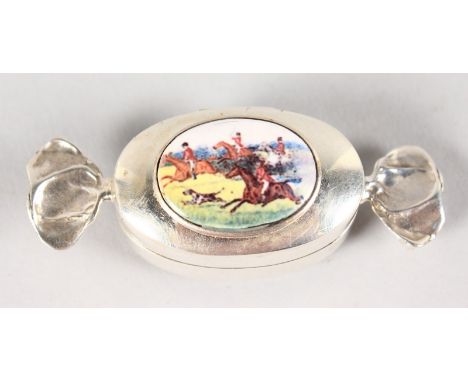 A SILVER PILL BOX, shaped like a sweet, the lid with a fox hunting scene.