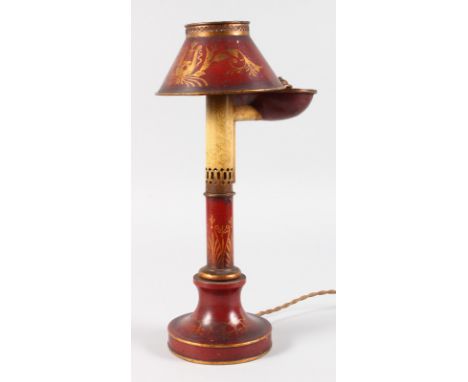 A TOLEWARE LAMP AND SHADE.