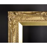 19th Century English School. A Gilt Composition Frame, with swept and pierced centres and corners,