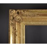 19th Century American School. A Gilt Composition Frame, with swept and pierced centres and