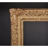 19th Century French School. A Louis Style Composition Frame, with swept centres and corners, 29" x