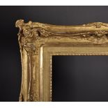 19th Century French School. A Gilt Composition Frame, with swept and pierced centres and corners,