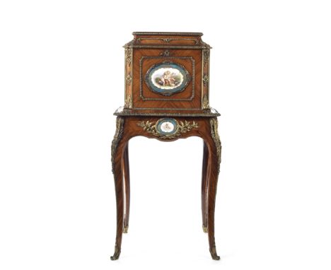 An early Victorian porcelain and ormolu mounted rosewood and tulipwood jewellery coffer on stand or coffre a bijoux attribute