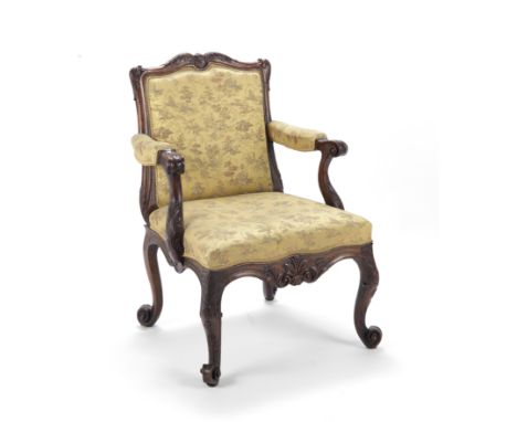 A George II walnut armchair1750-1755, either made by the firm of Wright and Elwick or executed by Paul SaundersThe shaped bea