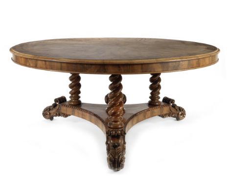 A William IV or early Victorian 'Antiquarian' yew wood centre table of large proportions1830-1845, possibly after a design by