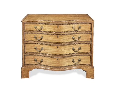 A George III satinwood, kingwood and rosewood crossbanded commodeCirca 1780With ebony and boxwood stringing, the top with an 