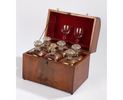 19th Century mahogany decanter box, the piano top hinged lid opening to reveal six decanters and two glasses decorated with g