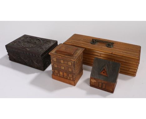 Two late 19th Century Swiss money boxes, in the form of buildings, 11cm and 10cm high, together with a Victorian faux bamboo 