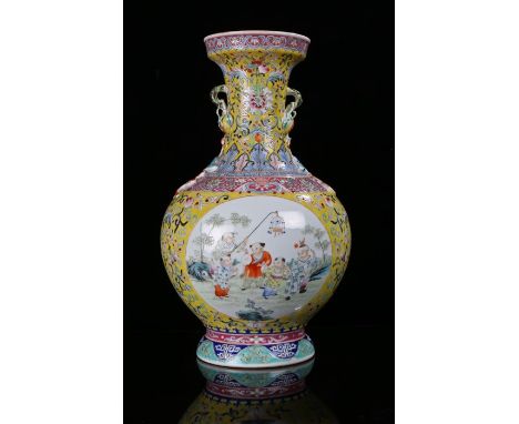 Fine Chinese porcelain vase, Qianlong six character mark, the yellow body with floral sprays, aubergine stylised handles abov