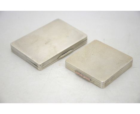 A heavy quality engine turned silver cigarette/card case, Padgett &amp; Braham Ltd, Jubilee marked London 1934 to/w a similar