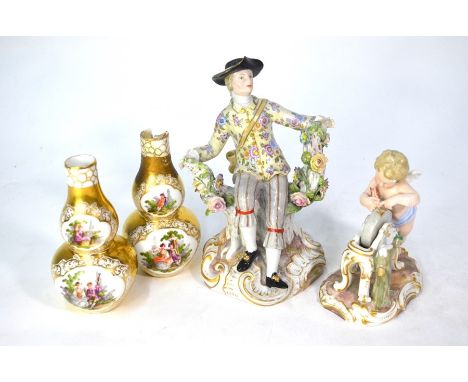A pair of 19th century Meissen miniature double gourd vases, painted with 18th century fete champetre figures on a gilded gro