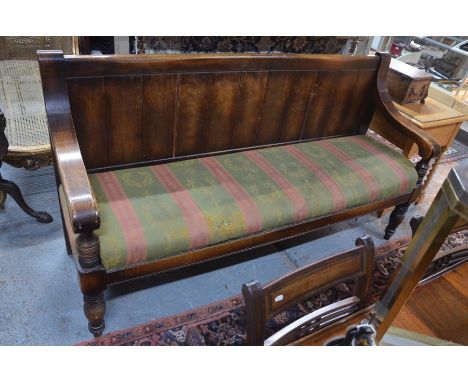A vintage oak framed settle with drop-in overstuffed seat, probably a waiting room fitting, 182 cm long x 99 cm h, the seat 5