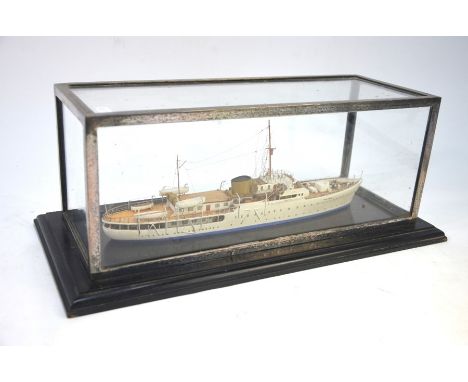 A scratch-built model ship - HMS Philante, 31 cm long in glazed silver-plated case on ebonised baseNote: Philante was sold 19