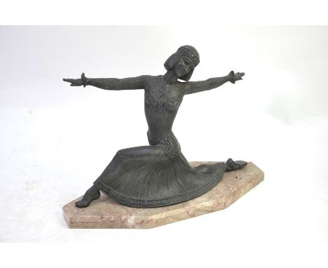 A 1930's vintage Art Deco spelter figure of an exotic dancing girl in flared skirt, on marble base, 26 x 36 cm o/a