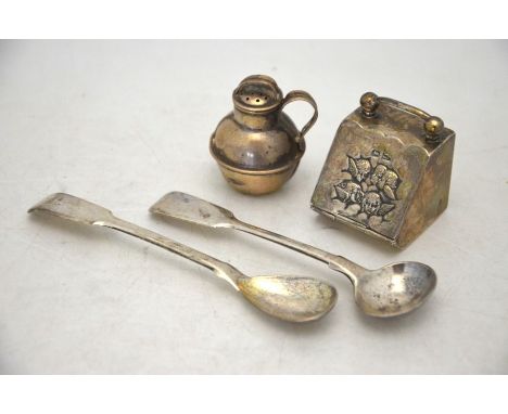 An Edwardian silver novelty pill-box in the form of a miniature coal-box, the fall front embossed with winged cherubs, Sheffi
