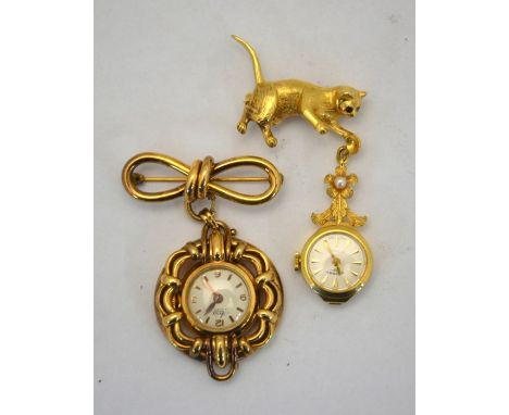 A lady's 9ct gold Rotary fob watch with 21 jewel movement on pearl-mounted bracelet suspended from a brooch in the form of a 