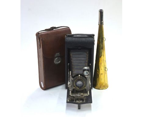 A Kodak no. 3-A Autographic model C folding camera with leather case, to/w a brass conical yachtsman's fog horn with plated m