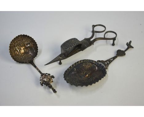 A late Victorian Continental silver marriage spoon with embossed bowl and cast stem, London import 1899, 25g to/w a Dutch 833