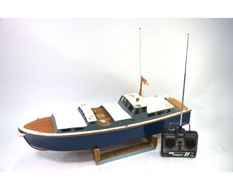 A vintage scratch-built model motor-launch with calin superstructure c/w steam engine drive, 45 cm