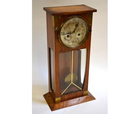 An Arts &amp; Crafts and Art Nouveau influenced 1930s mantle clock, with Archibald Knox style brass mounts and chiming moveme