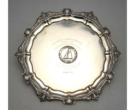 A heavy quality silver trophy salver - International Coronation Regatta, Torbay 1937 - the rim cast with Dolphins, shells and