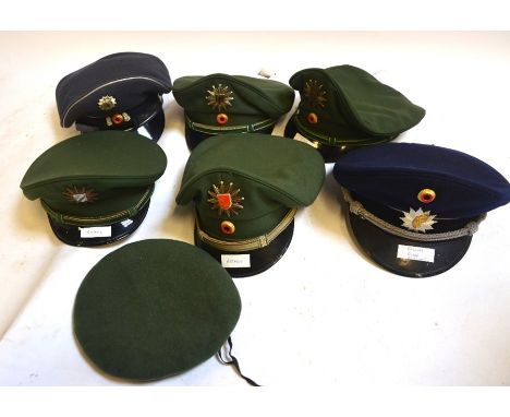 Seven vintage German police hats to include a beret comprising - Railway Police, Bremen, Bavaria, Berlin, Baden etc., to/w an