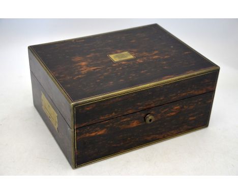 A Victorian brass-bound coromandel travelling toilet-case, the blue velvet and Morocco leather lining with hand-mirror and st