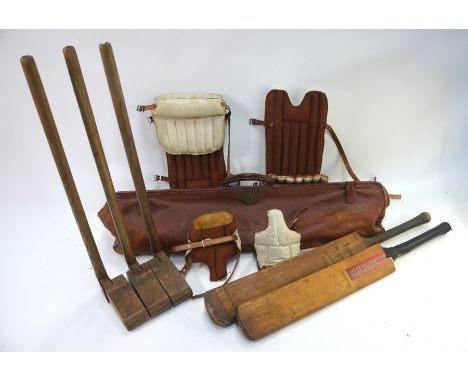 A vintage leather cricket bag and contents to/w a pair of Bryan boxing gloves, a squash racket, 19th century Scandinavian iro
