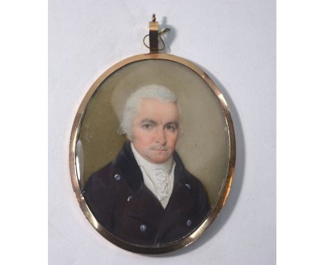 A George III oval portrait miniature on ivory of a gentleman in grey coat, in gilt metal pendant frame, 7 x 5.5 cm (back of f