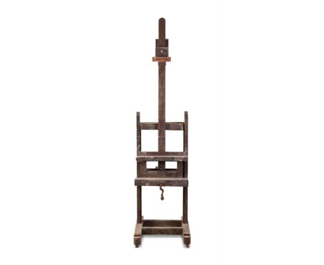 AN OAK ARTIST'S STUDIO EASEL FRENCH, BY BREVETE, 20TH CENTURY   Fully adjustable with iron cranks, stamped twice BREVETE / SG